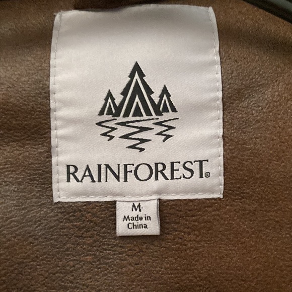 Rainforest, Jacket water resistant it’s a medium color is russe/brown - Picture 3 of 5